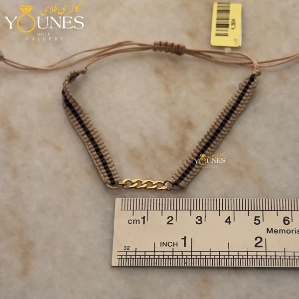 دستبند میوکی کرم خط مشکی کارتیر طلا